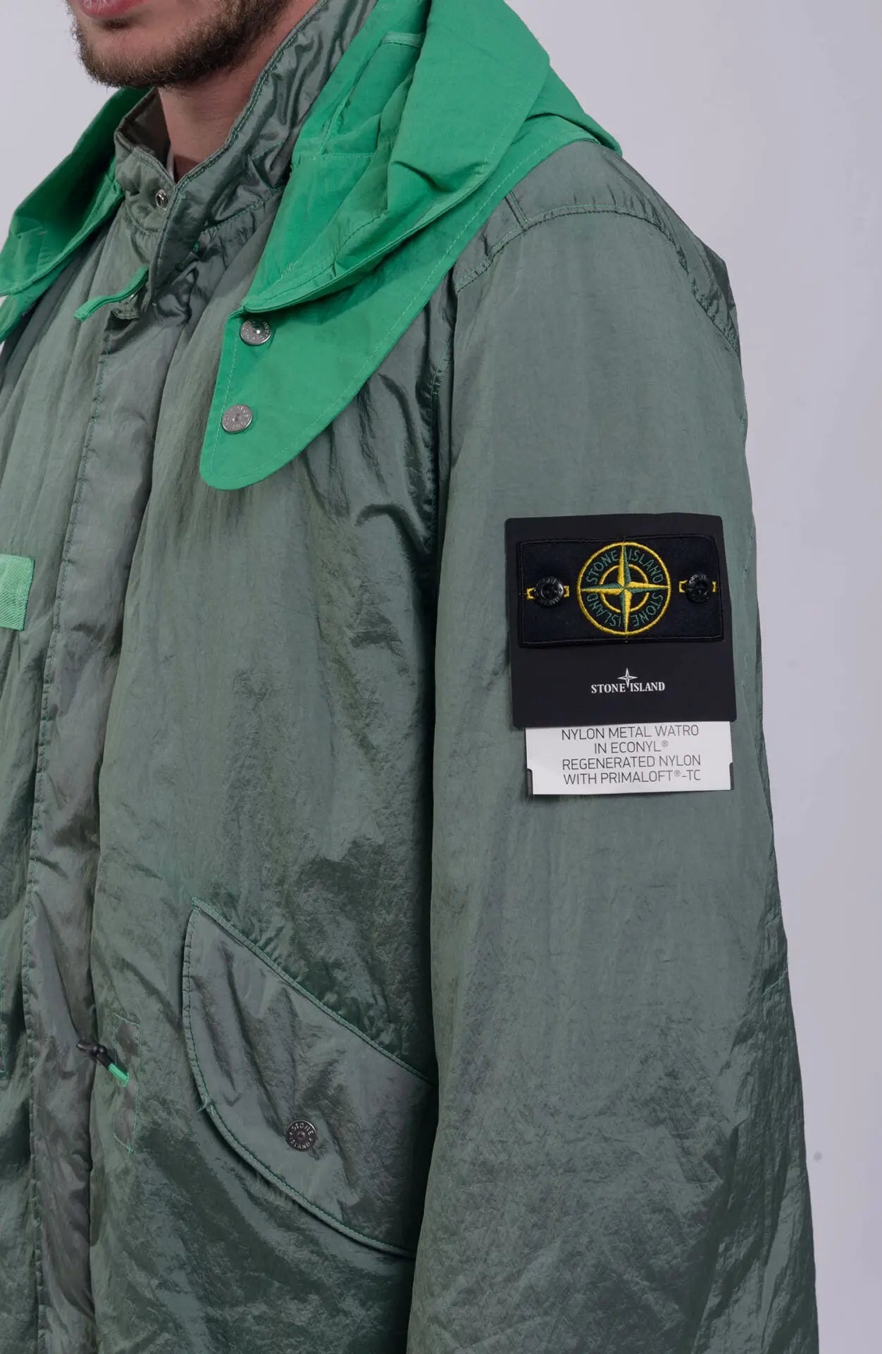 Stone Island, Green Male Jacket, Long Parka Jacket, Hooded, Stone Island Badge Close-up. 