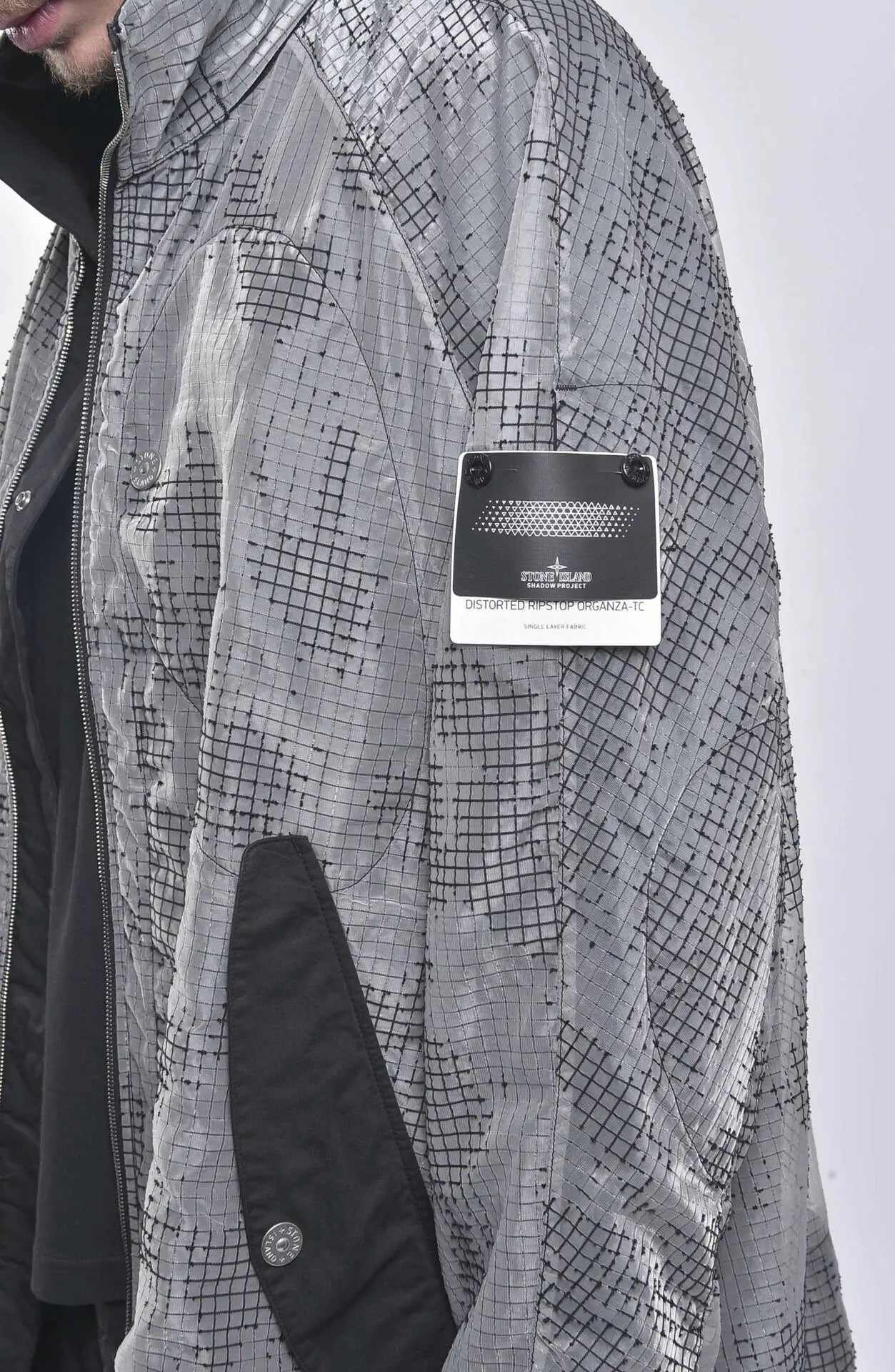 Stone Island, Shadow Project, Grey, Black, Mens Jacket, Fishtail Parka, Stone Island Badge, Fabric and Badge Detail Close-up