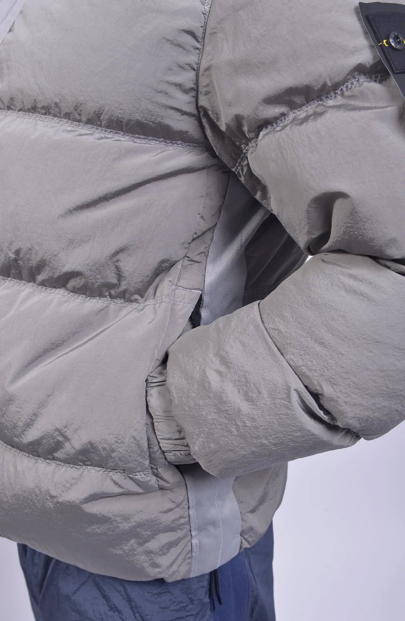Stone Island, Mens Jacket, Hooded Puffer Jacket, Grey Jacket V0160, Hidden Zipper, YKK Zipper, Compass Badge, Stone Island Buttons, Inside Pockets, Hand In Pocket Photo. 