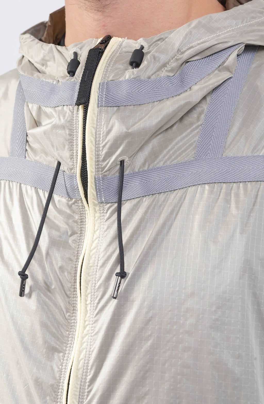 Stone Island, Mens Jacket, Windbreaker, Ivory White V0093, Semi-Transparent, Elasticated Cuffs, Full Zip, YKK Zippers, Compass Badge, Logo-Patch, Side Pockets, Hooded, Drawstring Close-up. 