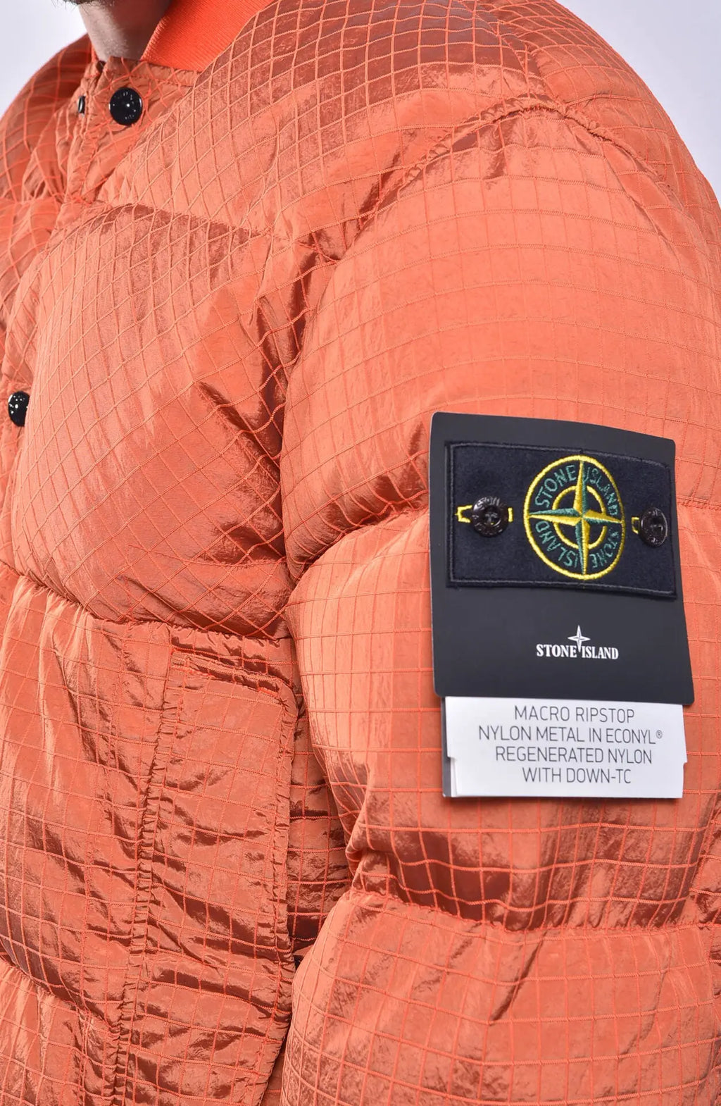 Stone Island, Mens Jacket, Bomber Jacket, Orange, YKK Zipper, Stone Island Buttons, Snaps, Stone Island Badge, Badge Close-up Photo. 