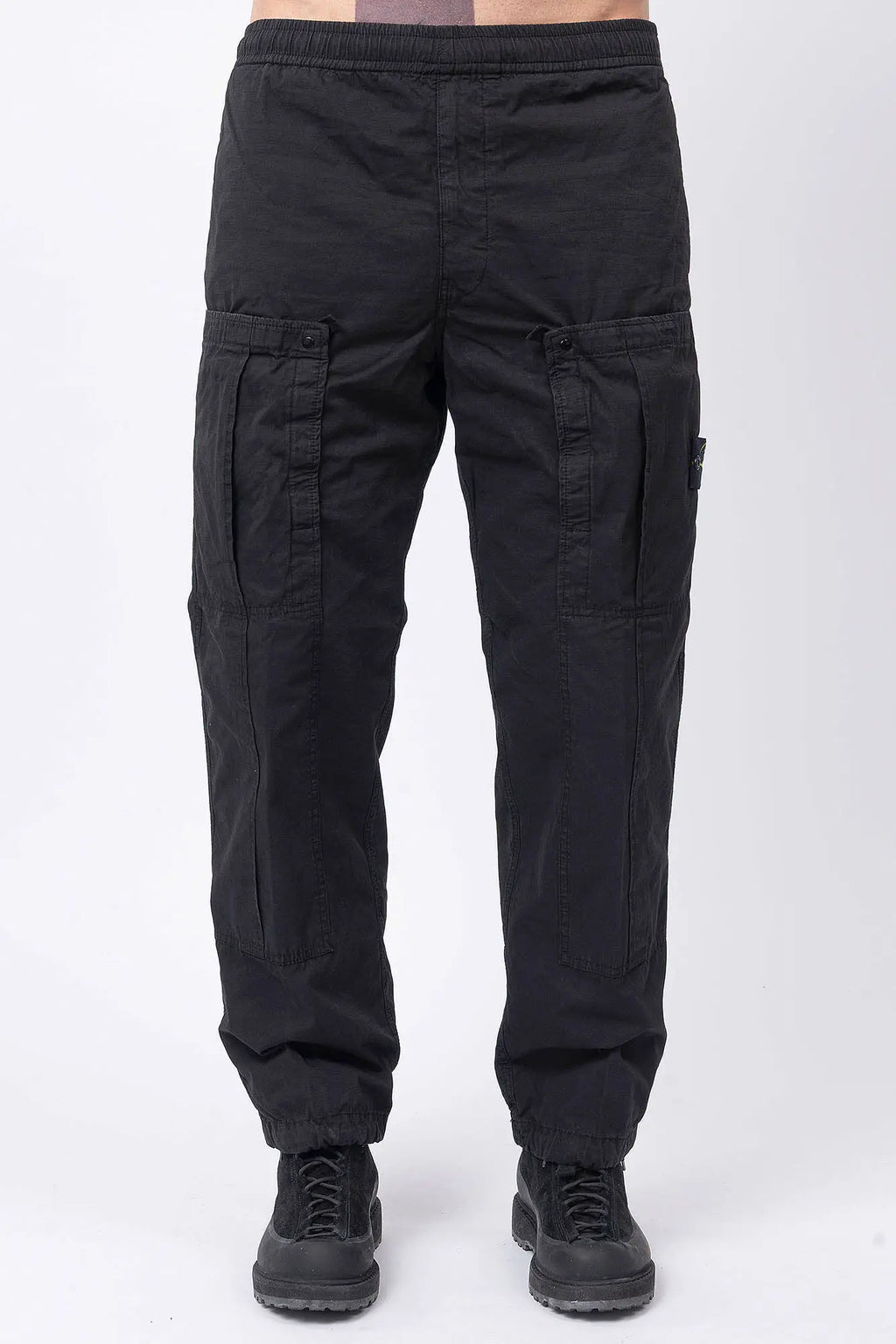Stone Island, Mens Pants, Black V0029, Mens Trousers, Side Pockets, Welt Pockets, Snap Closure Pockets, Compass Badge, Logo-patch, Signature Side Badge, Elasticated Ankle Cuffs, Elasticated Waistband, Side Pockets, Back Pockets, Front Portrait. 