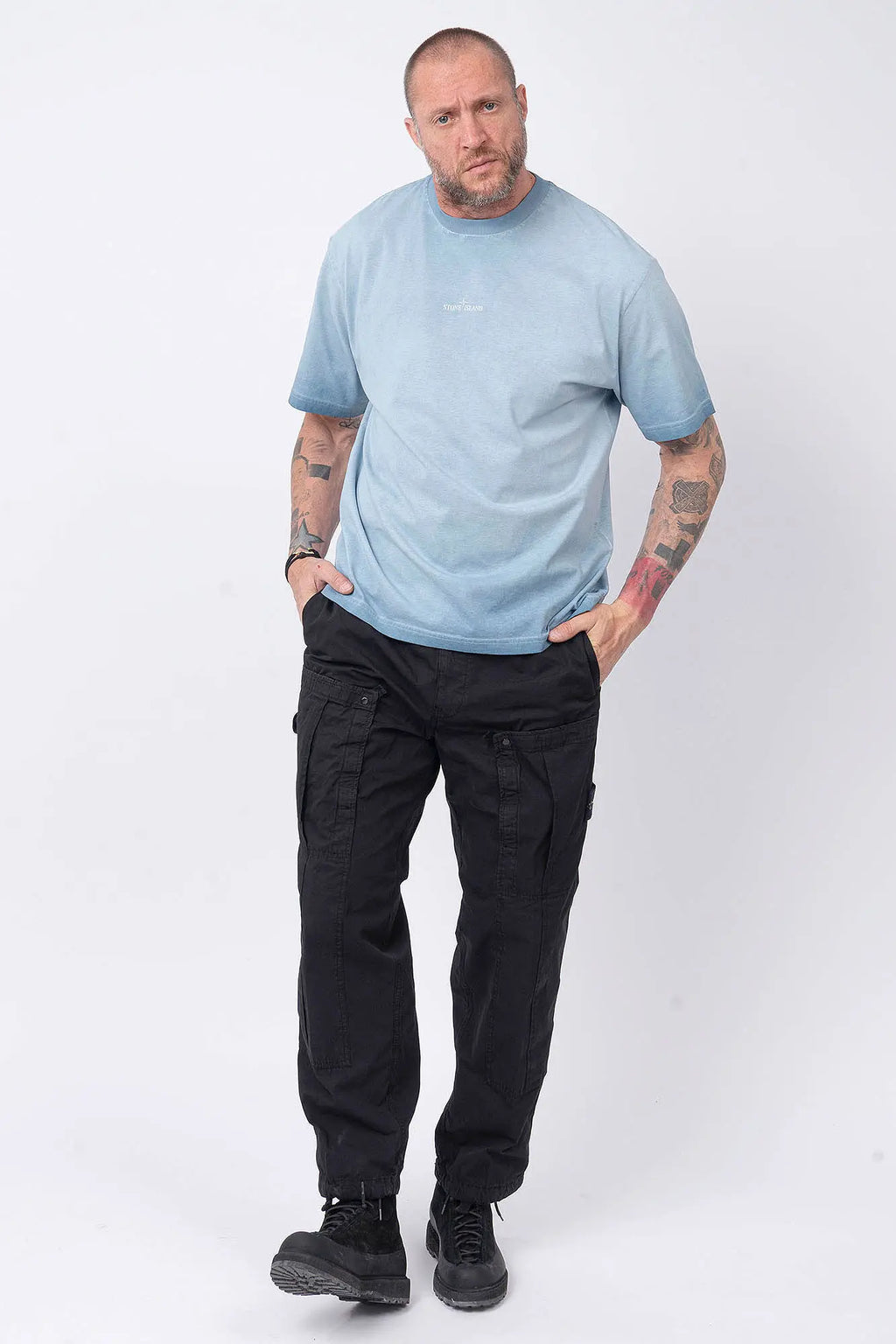 Stone Island, Mens Pants, Black V0029, Mens Trousers, Side Pockets, Welt Pockets, Snap Closure Pockets, Compass Badge, Logo-patch, Signature Side Badge, Elasticated Ankle Cuffs, Elasticated Waistband, Side Pockets, Back Pockets, Full Body Front View. 