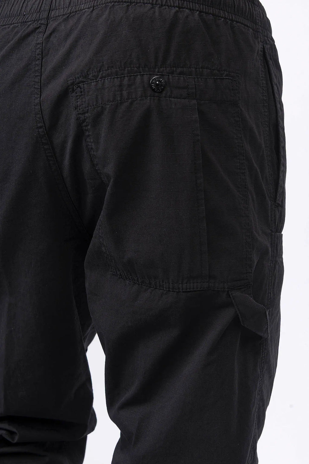 Stone Island, Mens Pants, Black V0029, Mens Trousers, Side Pockets, Welt Pockets, Snap Closure Pockets, Compass Badge, Logo-patch, Signature Side Badge, Elasticated Ankle Cuffs, Elasticated Waistband, Side Pockets, Back Pockets, Back Pocket Close-up. 