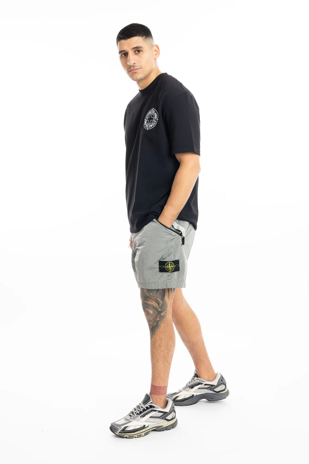 Stone Island, Mens Shorts, Grey V0061, Zip Pockets, Side Pockets, Ykk Zippers, Elasticated Waistband, Drawstring, Compass Badge, Logo-patch, Nylon Metal, Reebok Premier Road Ultra, Tattos, Full Body Hand in Pocket. 