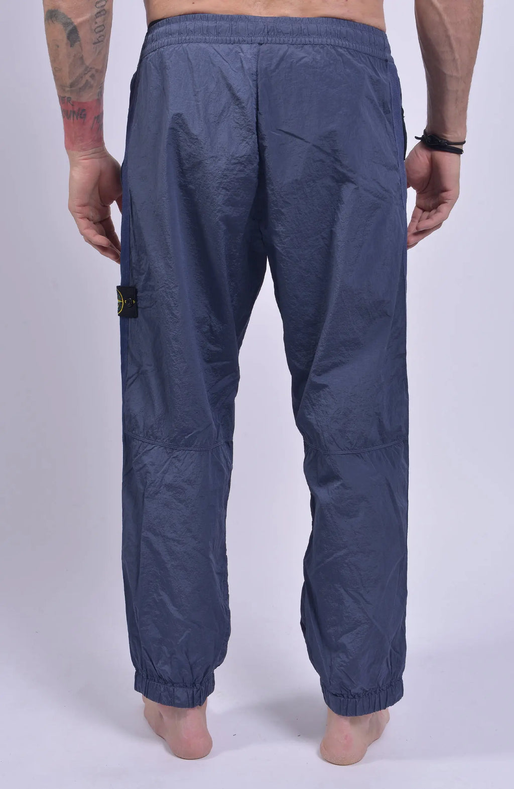 Stone Island, Mens Pants, Pastel Blue V0046, Loose Fit Joggers, Elasticated waistband, Drawstrings, Side Pockets, Compass Badge, Elasticated Ankles, YKK Zippers, Back Photo. 