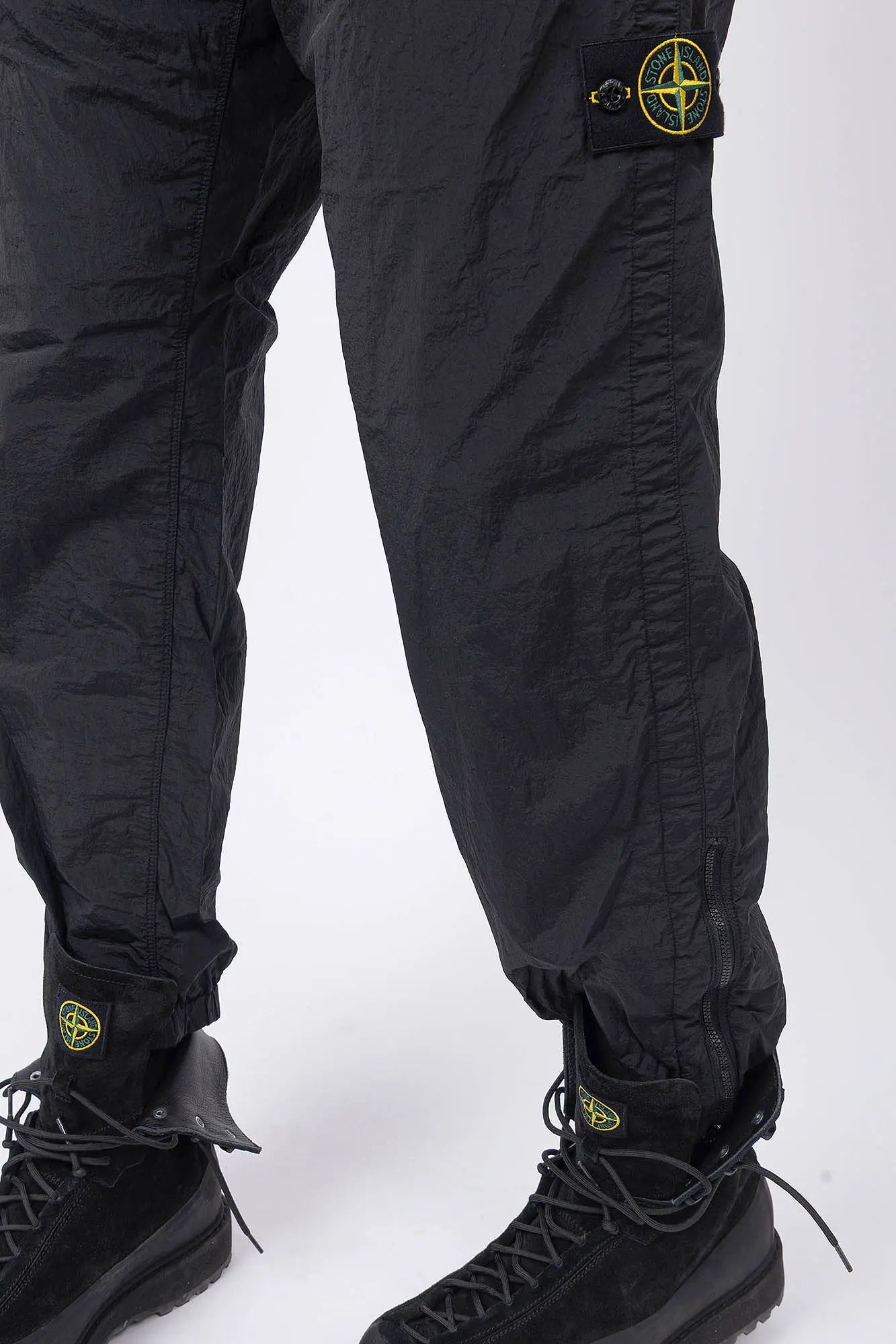 Stone Island, Mens Pants, Mens Trousers, Black V0029, Regular Fit, Tapered Legs, Side Pockets, Vertical Welt Pockets, Back Pockets, Elaticated Waistband, Drawstring Waist, Compass Badge, Logo-patch, Signature Side Badge, Leg Fit Showcase. 