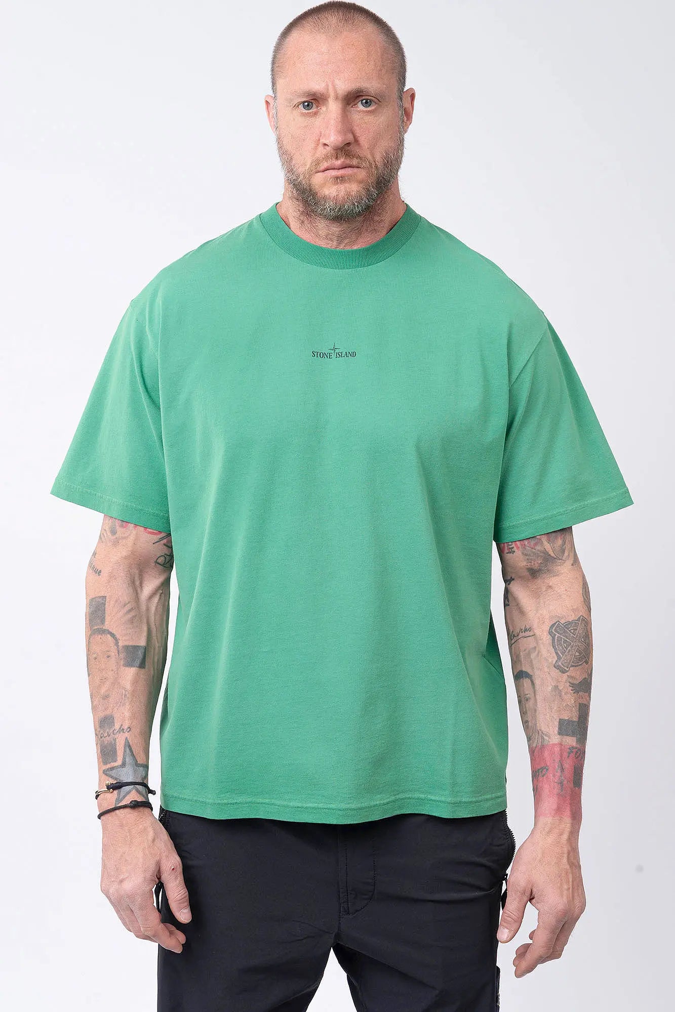 Stone Island, Mens T-Shirt, Malachite V005H, Green, Garment Dyed, Wide Fit, Short Sleeves, Ribbed Neck, Round Neck, Crewneck, Front and Back Print, Stone Island Print, Compass Print, Compass Badge, Logo-patch, Screen Print, Ribbed Hem and Sleeves, Front Portrait. 