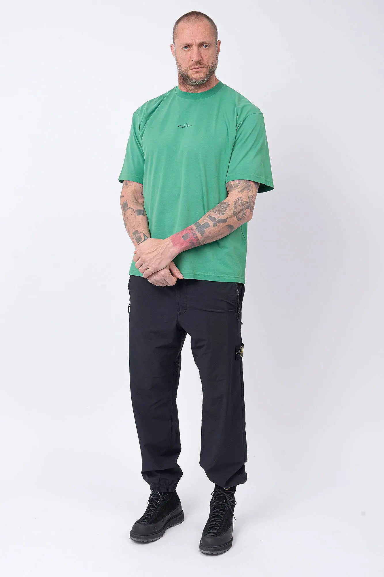 Stone Island, Mens T-Shirt, Malachite V005H, Green, Garment Dyed, Wide Fit, Short Sleeves, Ribbed Neck, Round Neck, Crewneck, Front and Back Print, Stone Island Print, Compass Print, Compass Badge, Logo-patch, Screen Print, Ribbed Hem and Sleeves, Full Body Front View. 