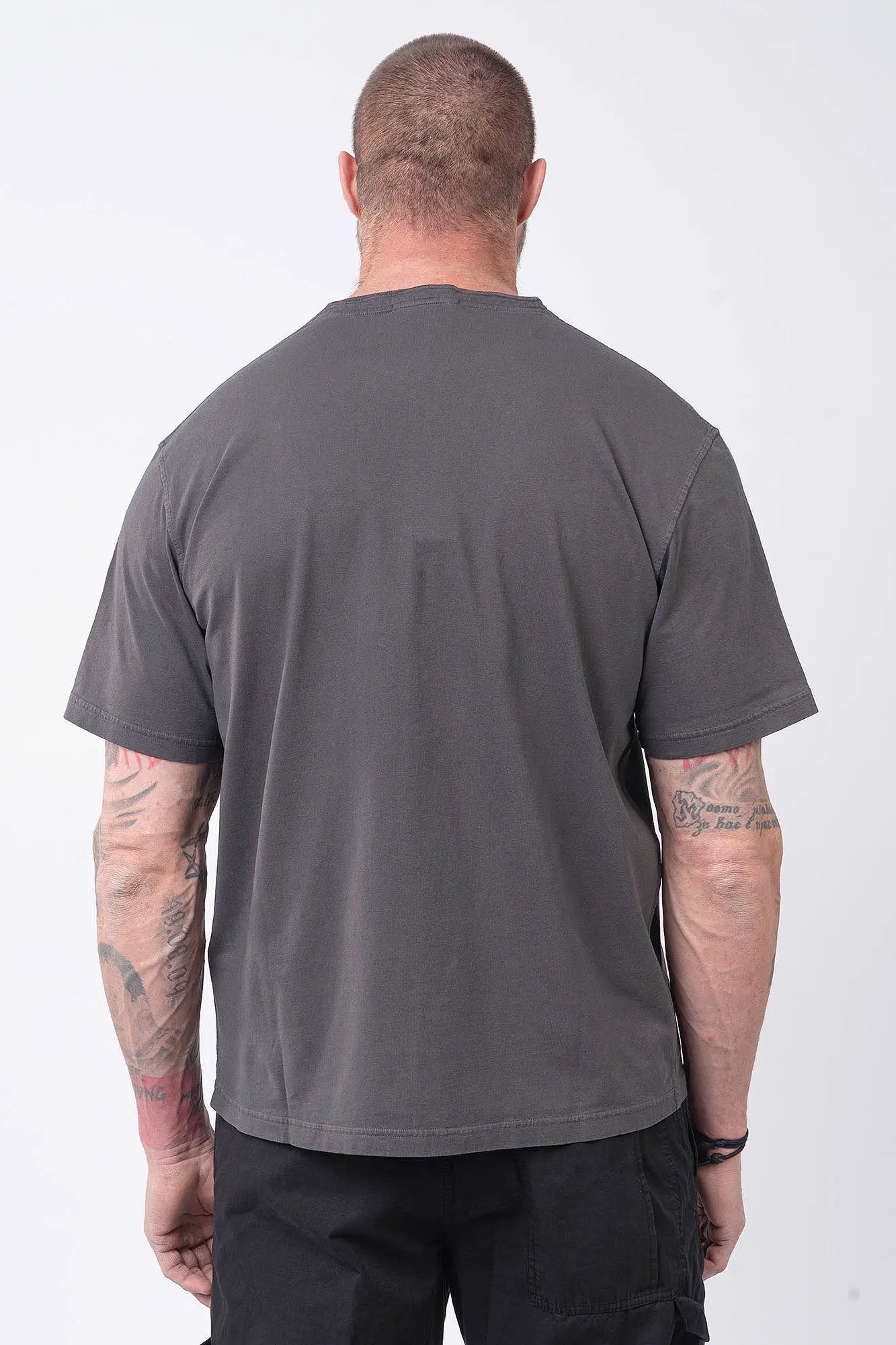 Stone Island, Mens T-Shirt, Charcoal V0165, Grey, Gray, Garment Dyed, Short Sleeves, Elastic Ribbing, Organic Cotton, Wide Fit, Raw-cut Neck, Crewneck, Round Neck, Compass Badge, Logo-patch, Chest Compass Patch, Back Portrait. 