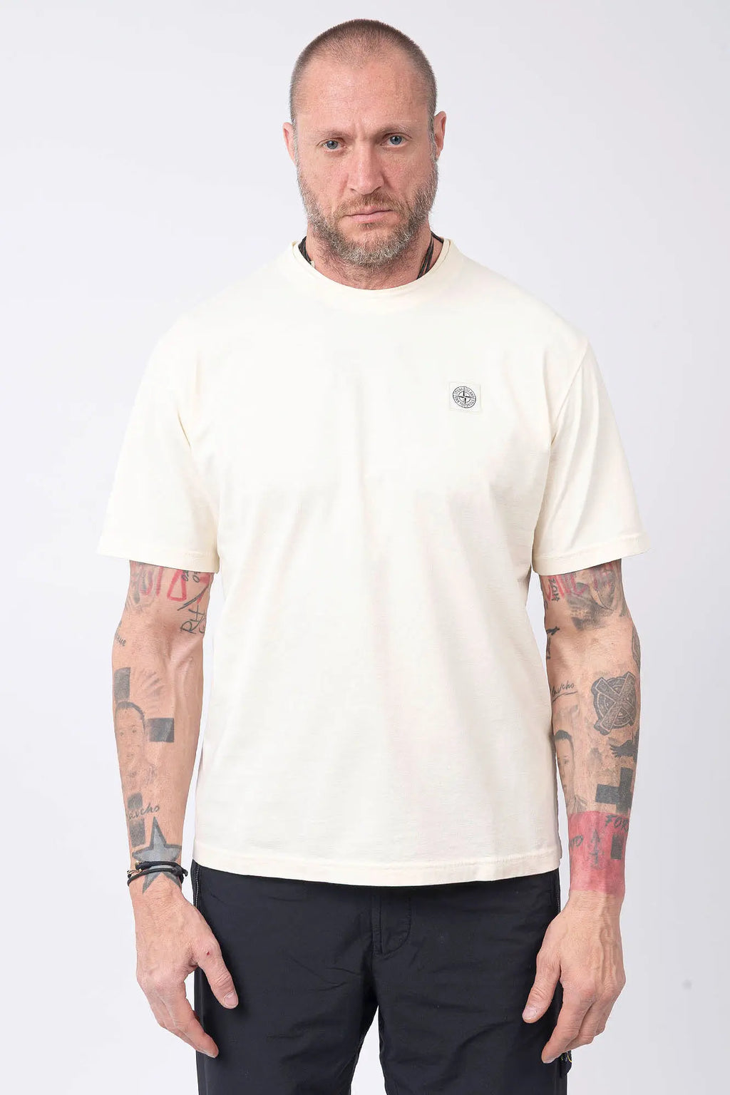 Stone Island, Mens T-Shirt, Ivory V0193, Off-White, White, Garment Dyed, Worn Effect, Short Sleeves, Elastic Ribbing, Organic Cotton, Wide Fit, Raw-cut Neck, Crewneck, Round Neck, Compass Badge, Logo-patch, Chest Compass Patch, Front Portrait. 