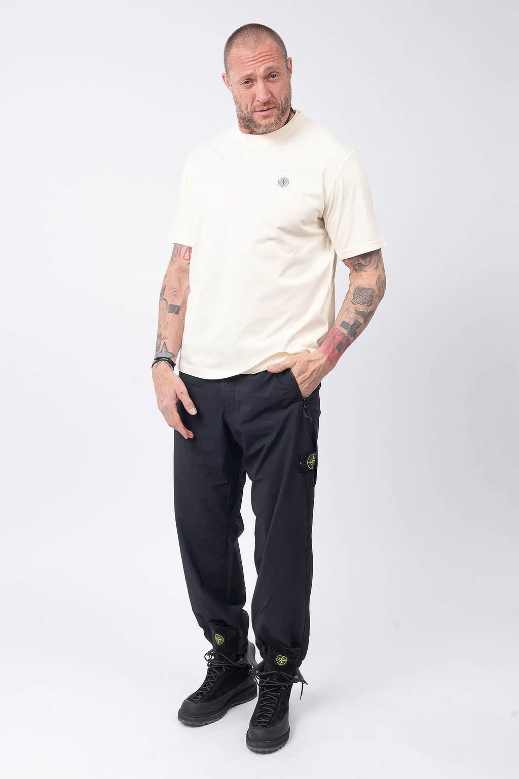 Stone Island, Mens T-Shirt, Ivory V0193, Off-White, White, Garment Dyed, Worn Effect, Short Sleeves, Elastic Ribbing, Organic Cotton, Wide Fit, Raw-cut Neck, Crewneck, Round Neck, Compass Badge, Logo-patch, Chest Compass Patch, Full Body Front View. 