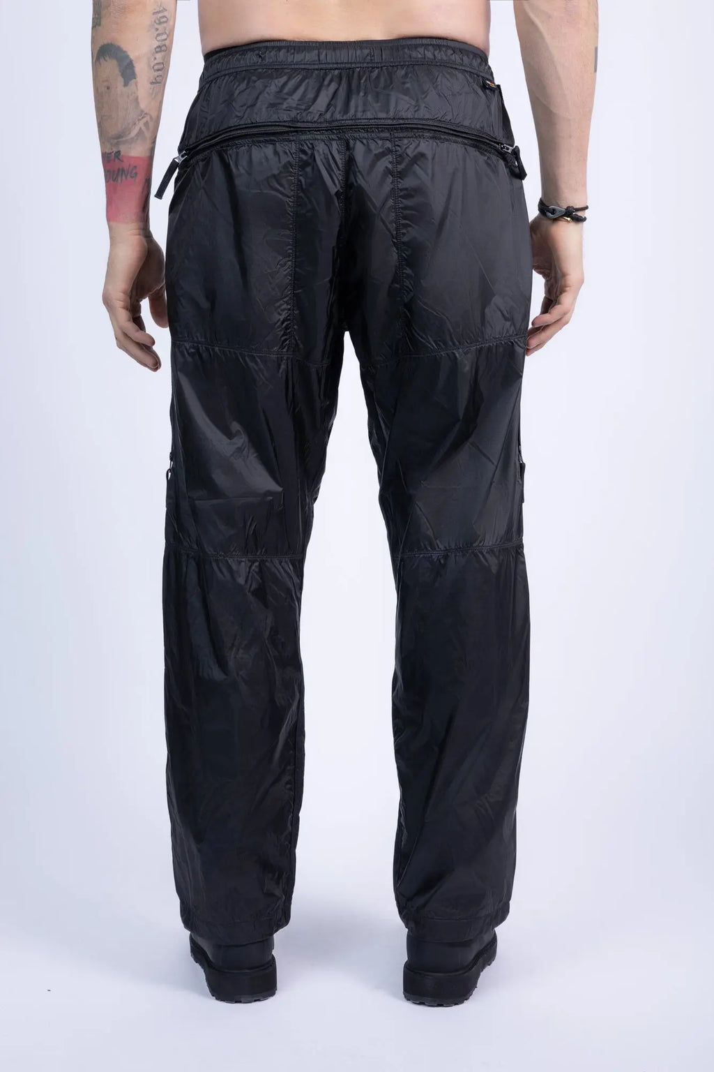 Stone Island, Mens Pants, Black V0029, Zip Details, Side Pockets, YKK Zippers, Zip Pockets, Compass Badge, Patch-logo, Elasticated cuffs, Drawstring Cord, Back Photo. 
