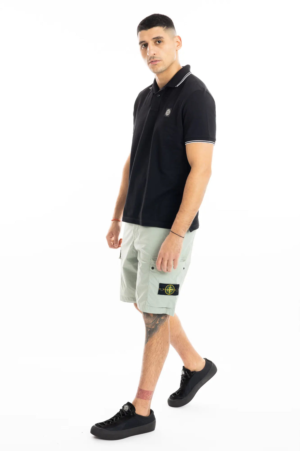 Stone Island, Mens Bermuda Shorts, Sage Green S0055, Compass Badge, Logo-patch, Side Flap Pockets, Stone Island Buttons, Belt Loops, Light Stretch Cotton Tela, Zip Fly, YKK Zipper, 3/4 Full Body Front View. 