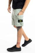 Stone Island, Mens Bermuda Shorts, Sage Green S0055, Compass Badge, Logo-patch, Side Flap Pockets, Stone Island Buttons, Belt Loops, Light Stretch Cotton Tela, Zip Fly, YKK Zipper, 3/4 Front View. 