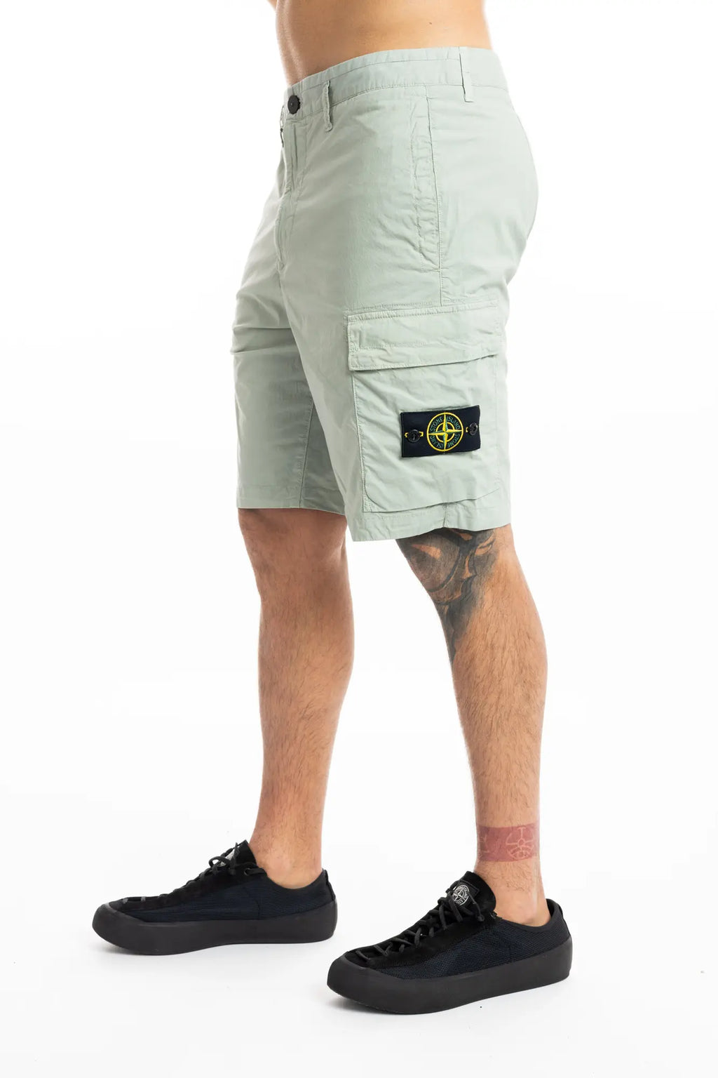 Stone Island, Mens Bermuda Shorts, Sage Green S0055, Compass Badge, Logo-patch, Side Flap Pockets, Stone Island Buttons, Belt Loops, Light Stretch Cotton Tela, Zip Fly, YKK Zipper, Side View. 