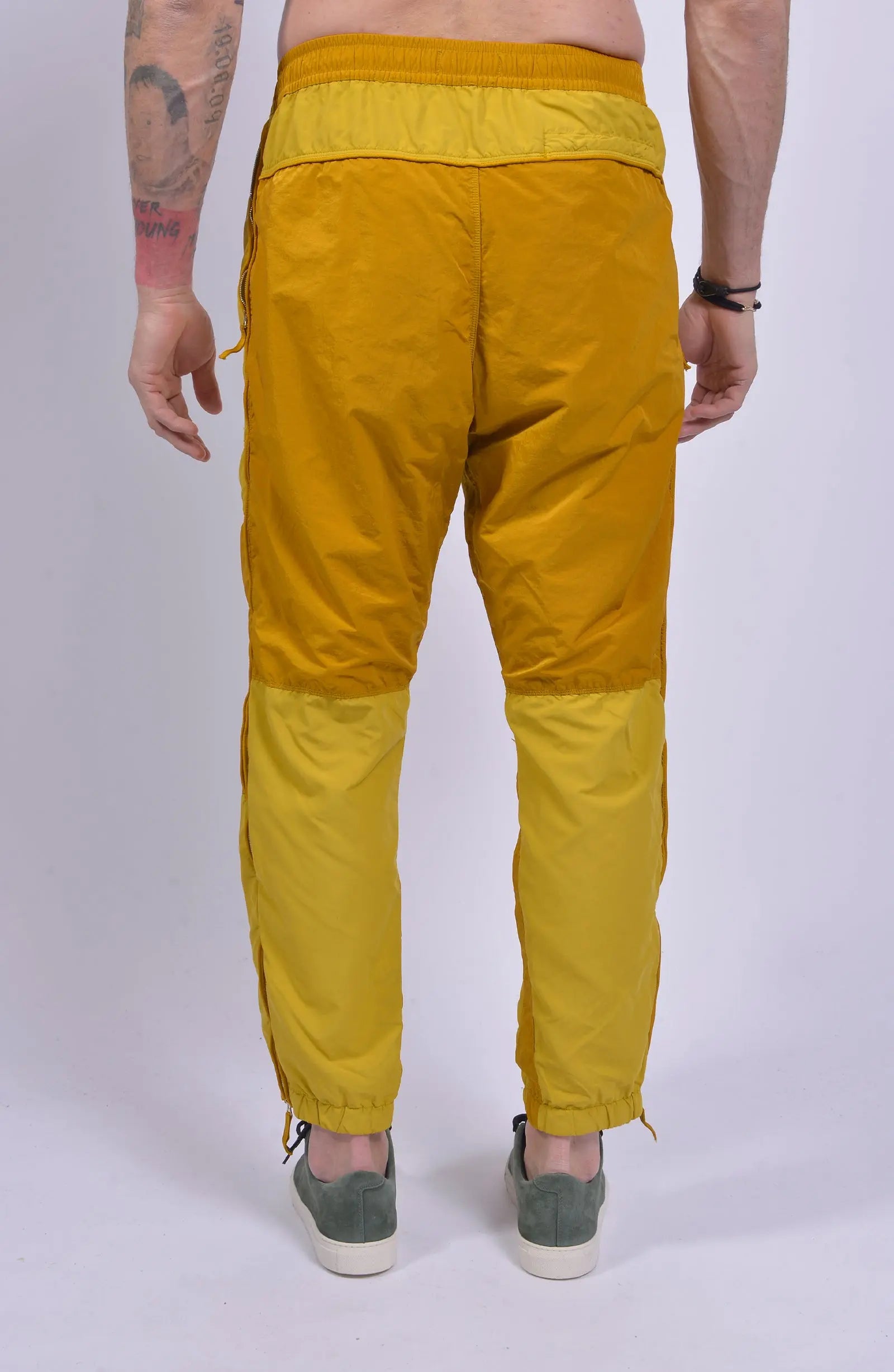 Stone Island, Mens Pants, Yellow, Orange, Elasticated Waistband, Elasticated Ankles, YKK Zippers, Zipper Pockets, Side Pockets, Compass Embroidery, Back Shot. 